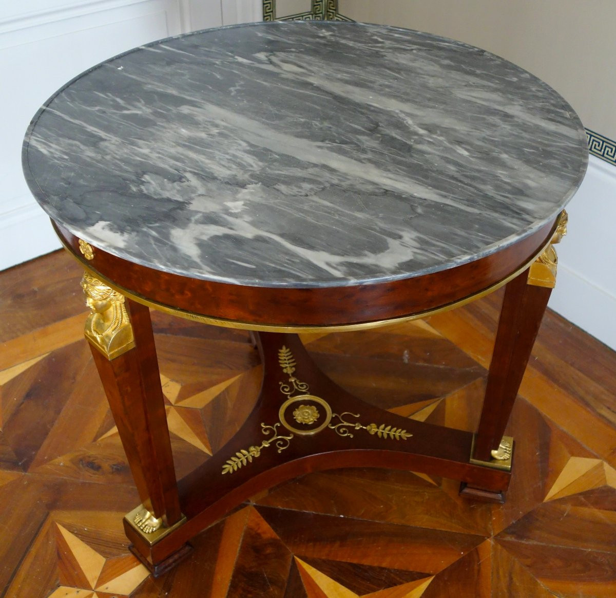 A Mahogany Pedestal Table From The Consulate/empire Period, With Rich Gilt Bronze Mounts And A Turquin Marble Top.-photo-3