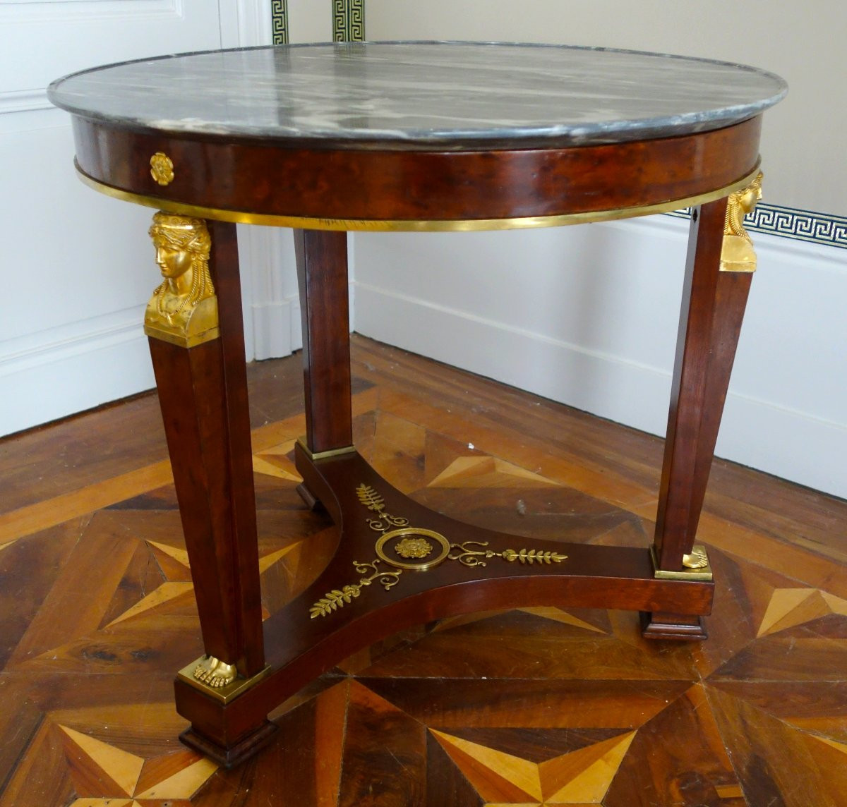 A Mahogany Pedestal Table From The Consulate/empire Period, With Rich Gilt Bronze Mounts And A Turquin Marble Top.-photo-4