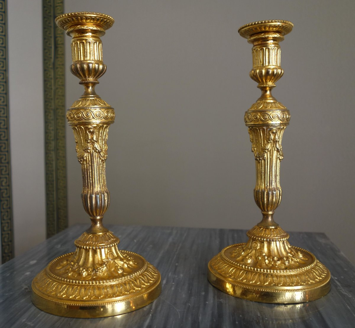 Pair Of Louis XVI Style Candlesticks In Chased And Gilded Bronze-photo-2