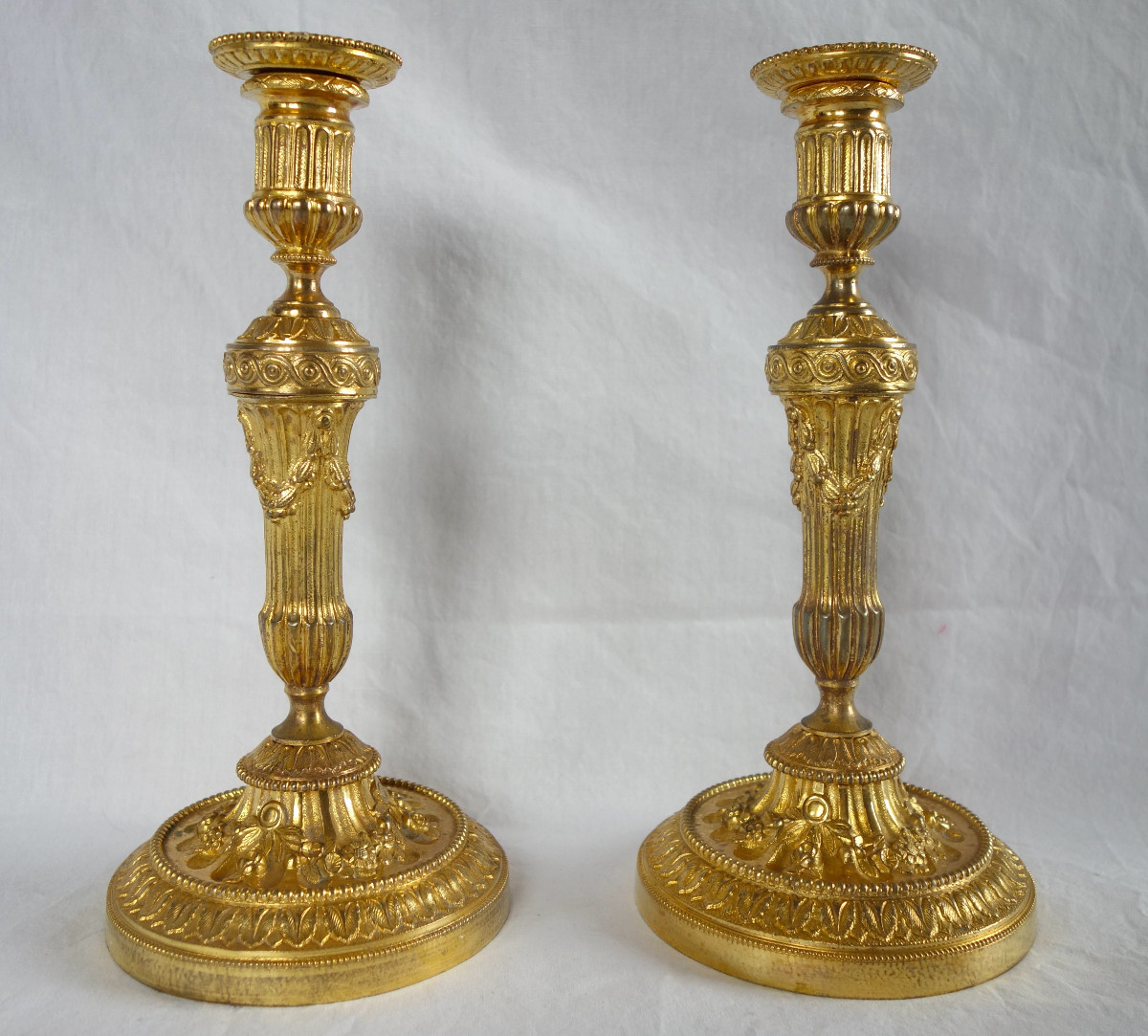 Pair Of Louis XVI Style Candlesticks In Chased And Gilded Bronze-photo-3