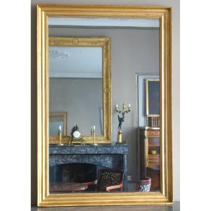 Miroir de cheminée en bois doré feuille d'or glace au mercure à tain pailleté 142x97cm