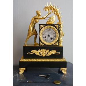 The Cocoa Harvest - Empire Clock In Patinated And Gilded Bronze From The Restoration Period