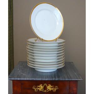 Service de 12 assiettes de table en porcelaine à filets or, fin XVIIIe siècle