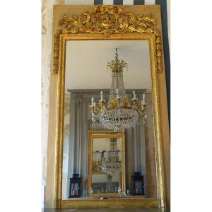   Trumeau, miroir de boiserie d'époque Louis XVI en bois laqué et doré, glace au mercure