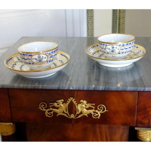 Nyon: Pair Of 18th-century Porcelain Coffee Or Tea Cups—signed—with Blue And Gold Decoration