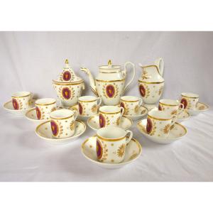 Service à café d'époque Empire pour 10, porcelaine de Paris dorée - 13 pièces