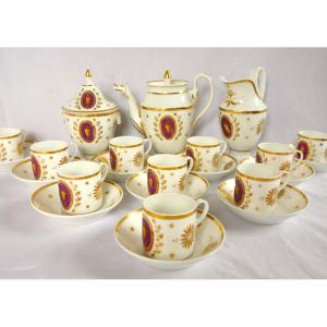 Service à café d'époque Empire pour 10, porcelaine de Paris dorée - 13 pièces
