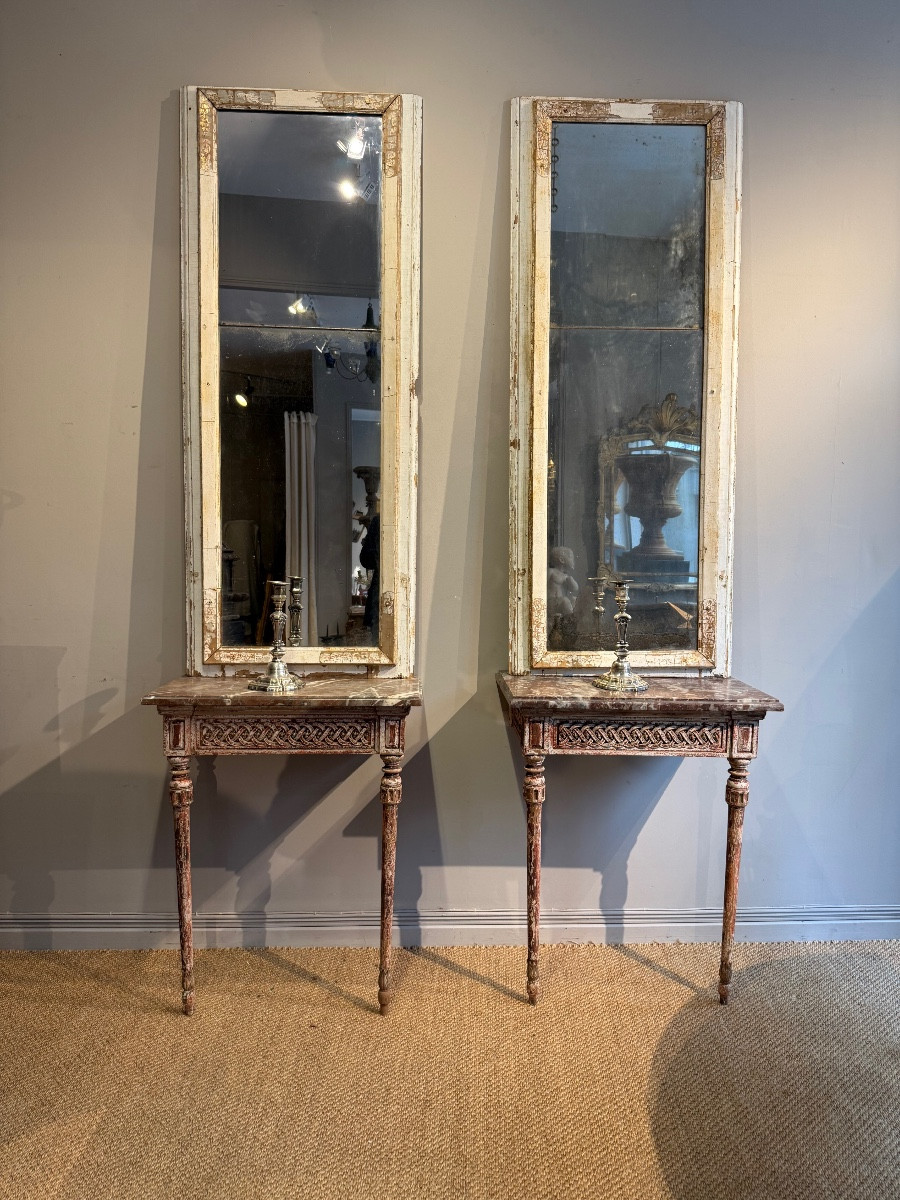 Paire de consoles avec leur paire de miroirs 