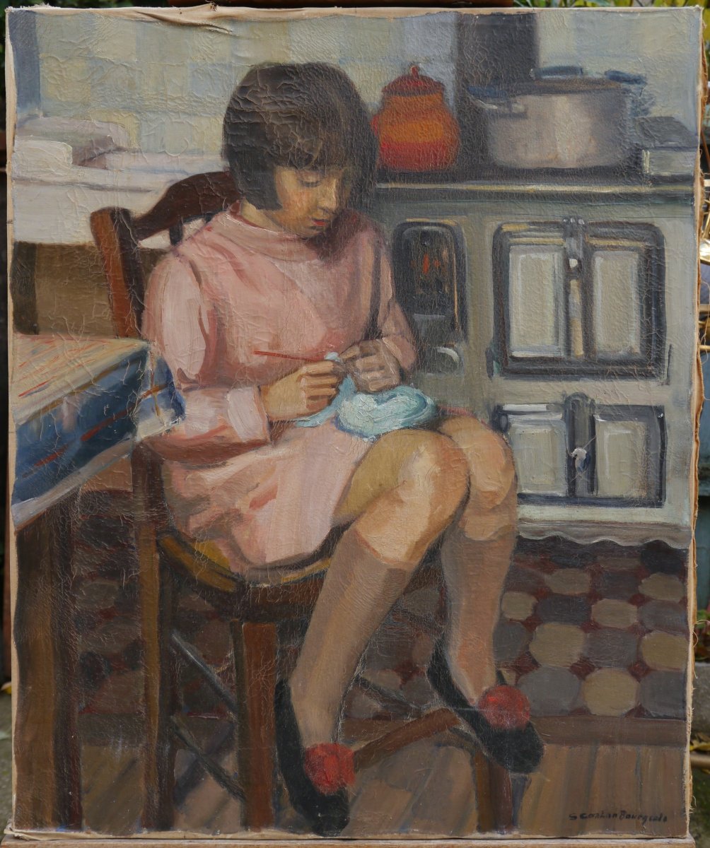 Jeune fille au tricot dans une cuisine, Ecole vers 1930/40