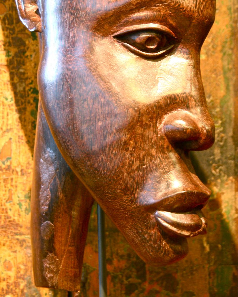 Pair Of African Masks In Palm Tree Of The 50's-photo-1