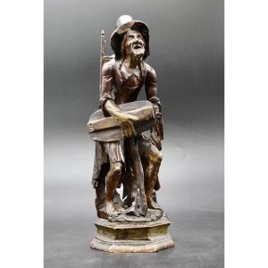 sculpture XIXème vielle femme à le vièle