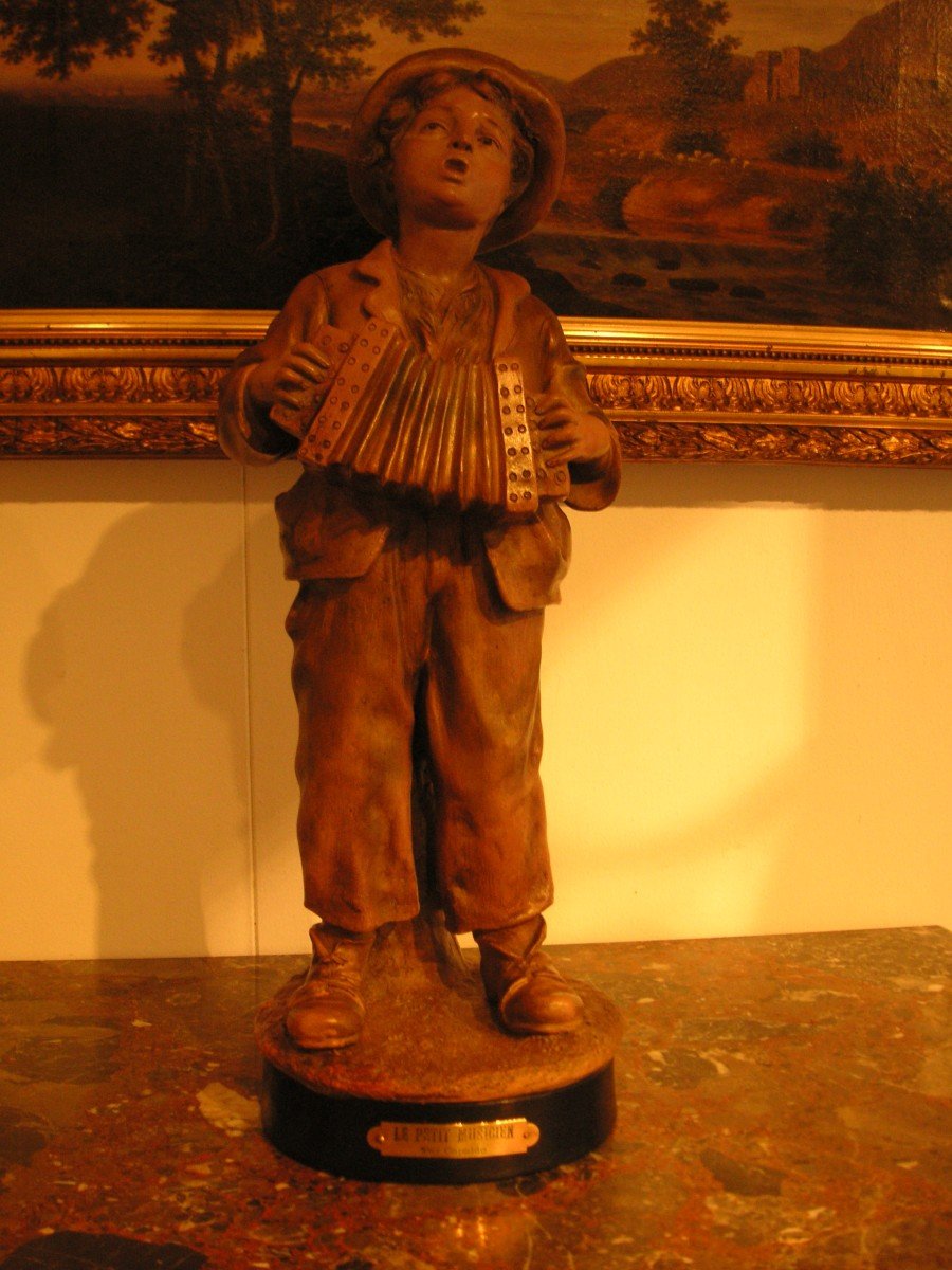 Terre cuite "Le musicien" par Capaldo  / Art déco/46 cm