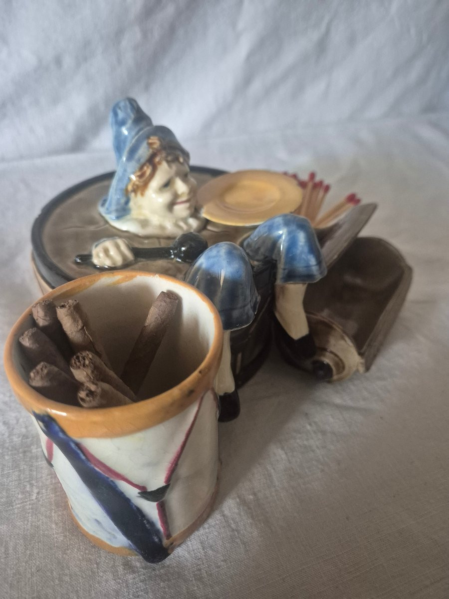 Child Playing Drums Forming A Smoker's Service In Slipware -photo-3