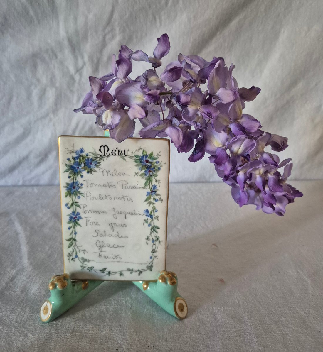 Menu de table sur chevalet formant un vase-photo-1