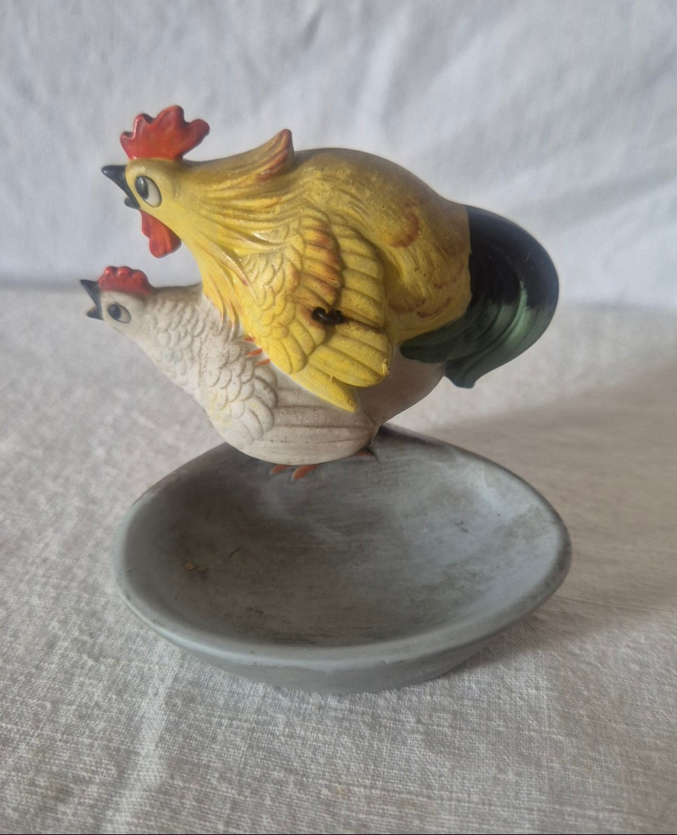 Cendrier vide poche trembleur de poule et de coq en suspension pour un effet de bascule