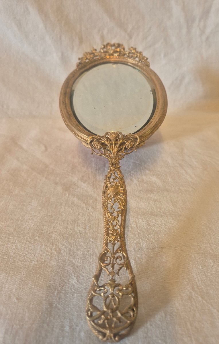 Miroir face à main au mercure et biseauté en bronze doré Second Empire -photo-1