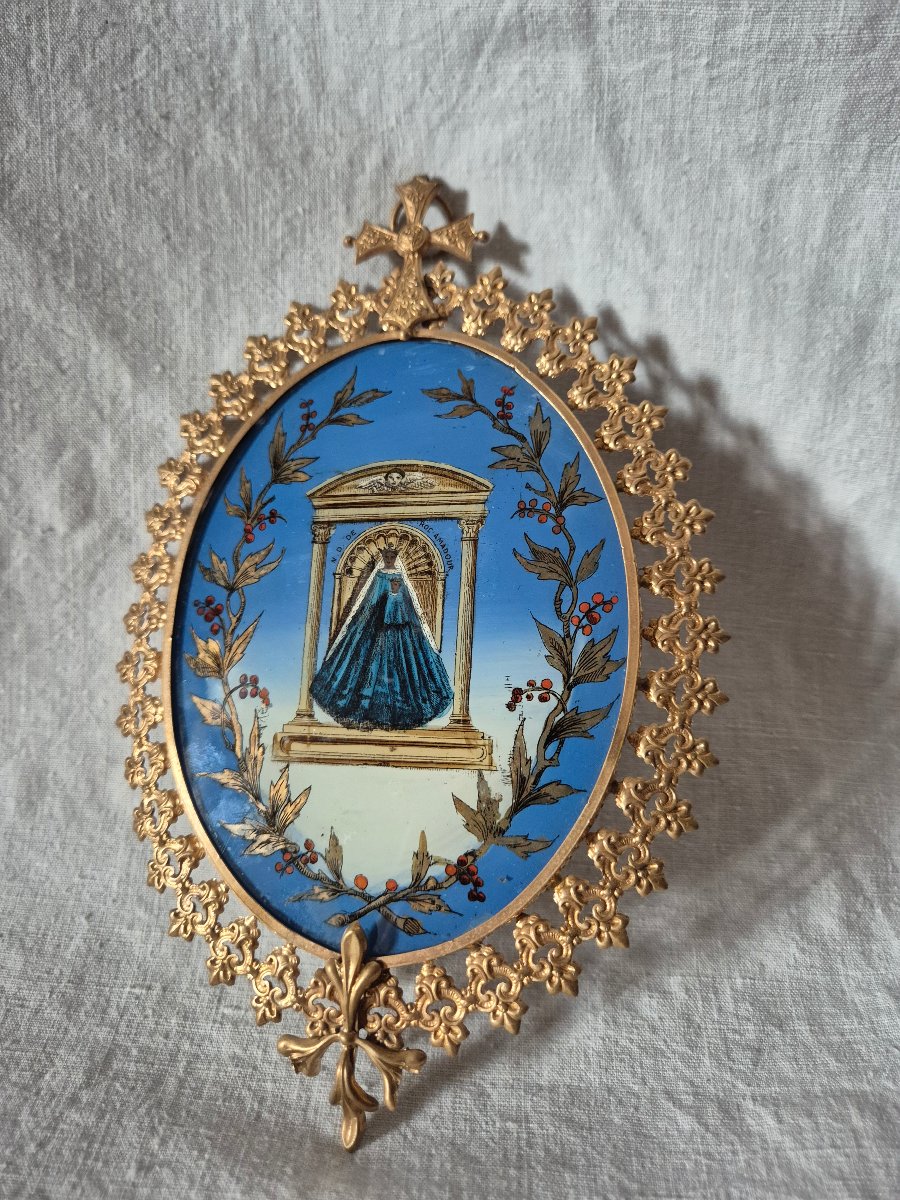 Fixé sous verre Notre Dame de Rocamadour dans son cadre en pomponne doré du XIXème siècle 