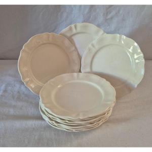 Ensemble de dix assiettes à entremet en faïence "ivoire" de Sarreguemines 