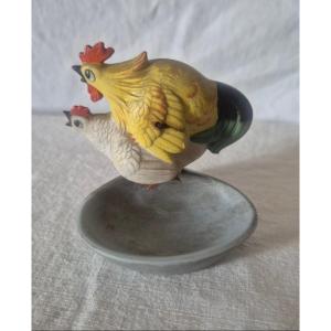 Cendrier vide poche trembleur de poule et de coq en suspension pour un effet de bascule