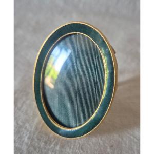 Cadre photo médaillon ovale bronze doré et émail vert