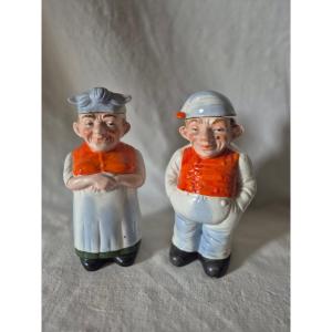 2 Anthropomorphic Bottles Depicting A Couple Of Simple-looking Farmers