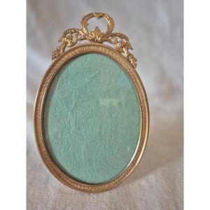 Cadre photo bronze doré ovale du XIXème siècle 