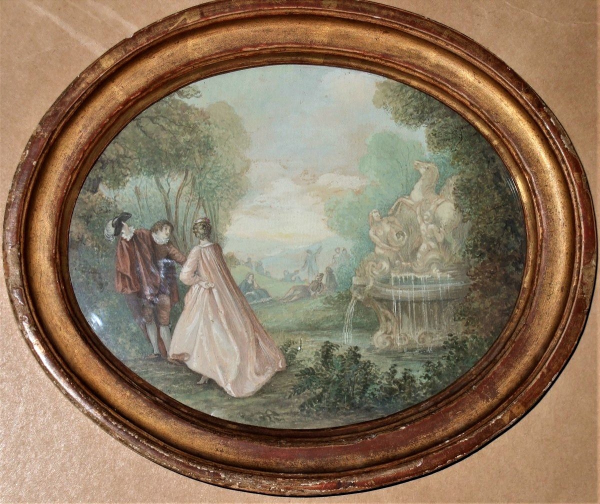 Ecole française du XVIIIè. Scène galante dans un parc, une fontaine sur la droite.