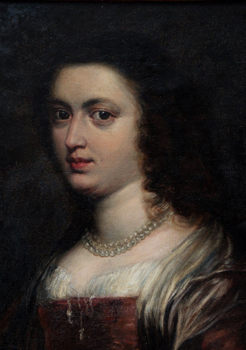 Ecole du XIXè. Portrait de femme au collier de perles.
