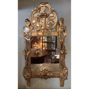 MIROIR A PARCLOSES EN BOIS DORE XIXe
