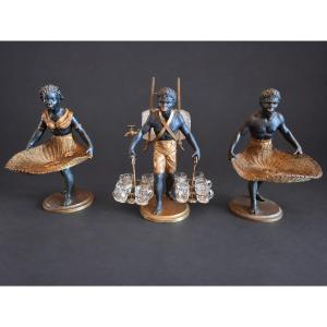 A Group Of Three Nubian Porters
