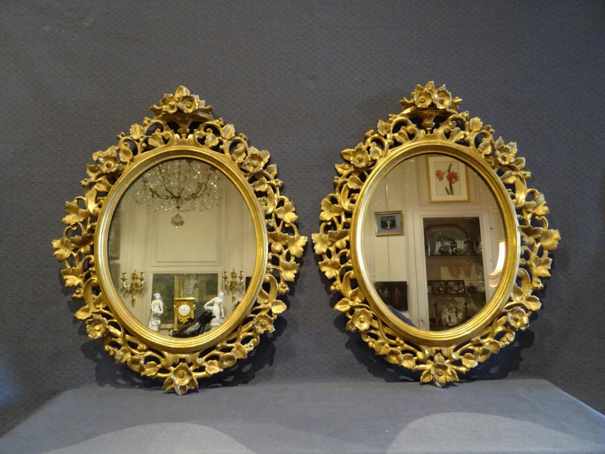 Paire de miroirs en bois doré XIX eme