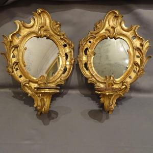 Paire d'appliques miroir en bois doré XVIII