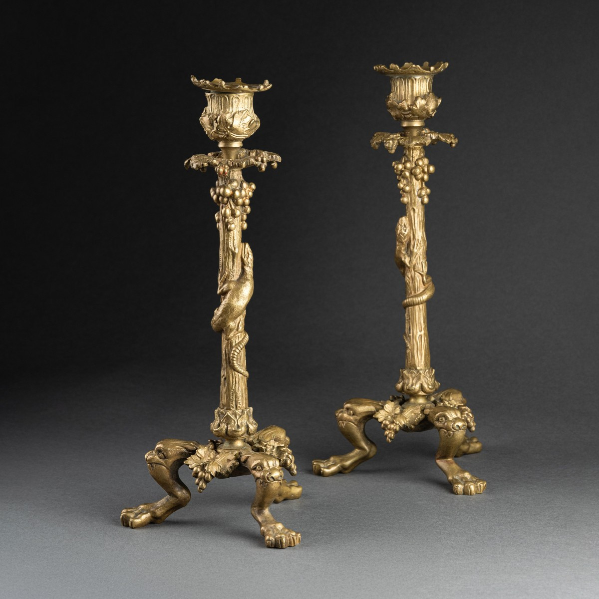 Pair Of Gilt Bronze Candlesticks. Decorated With A Lizard And Bunches Of Grapes, Late 19th Century.