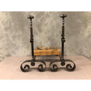 Pair Of Antique Andirons In Polished Iron From The 19th Century