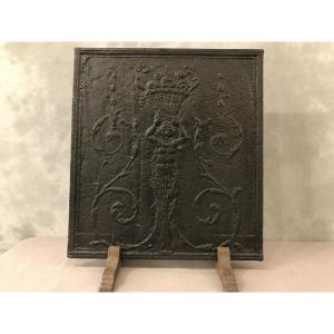 Plaque de cheminée ancienne en fonte noire d’époque début 19 ème 