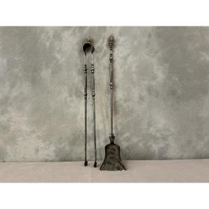 Ensemble d’une pelle et d’une pince en fer et bronze d’époque 19 ème 