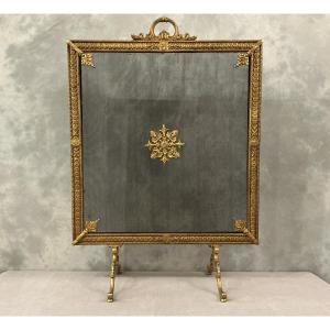 Grand écran de cheminée en bronze doré d’époque 19 ème de style Louis XVI