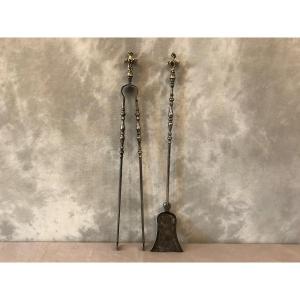 Antique Fireplace Set Of A Shovel And A Clamp In Iron And Bronze From The 19th Century