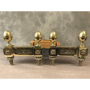 Pair Of Old Andirons In Polished Bronze From The 18th Louis XVI Period