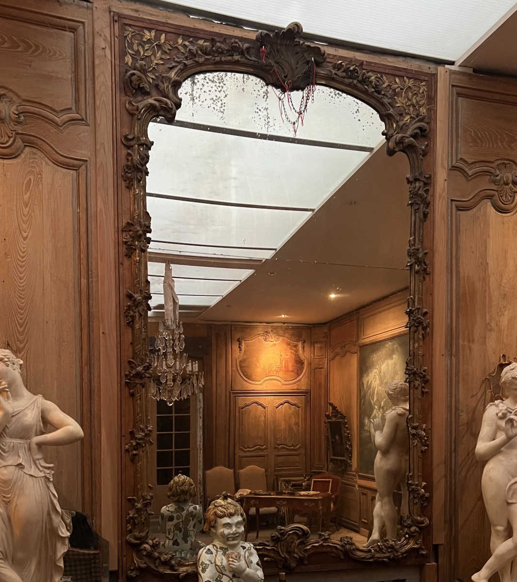 Grand trumeau de style Louis XV à décor floral ajouré