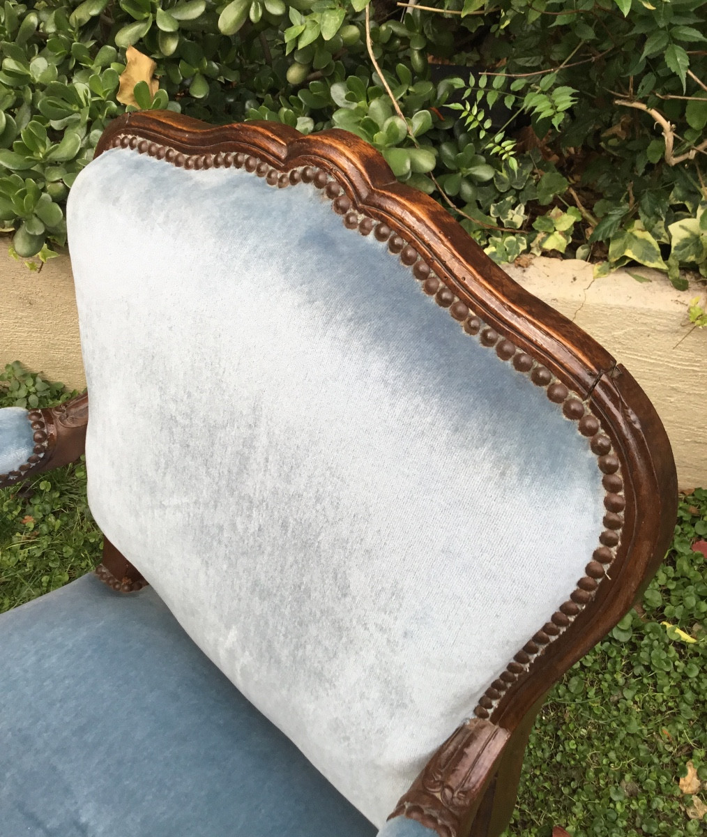 Epoque régence.fauteuil à dossier plat en bois fruitier mouluré et sculpté -photo-1