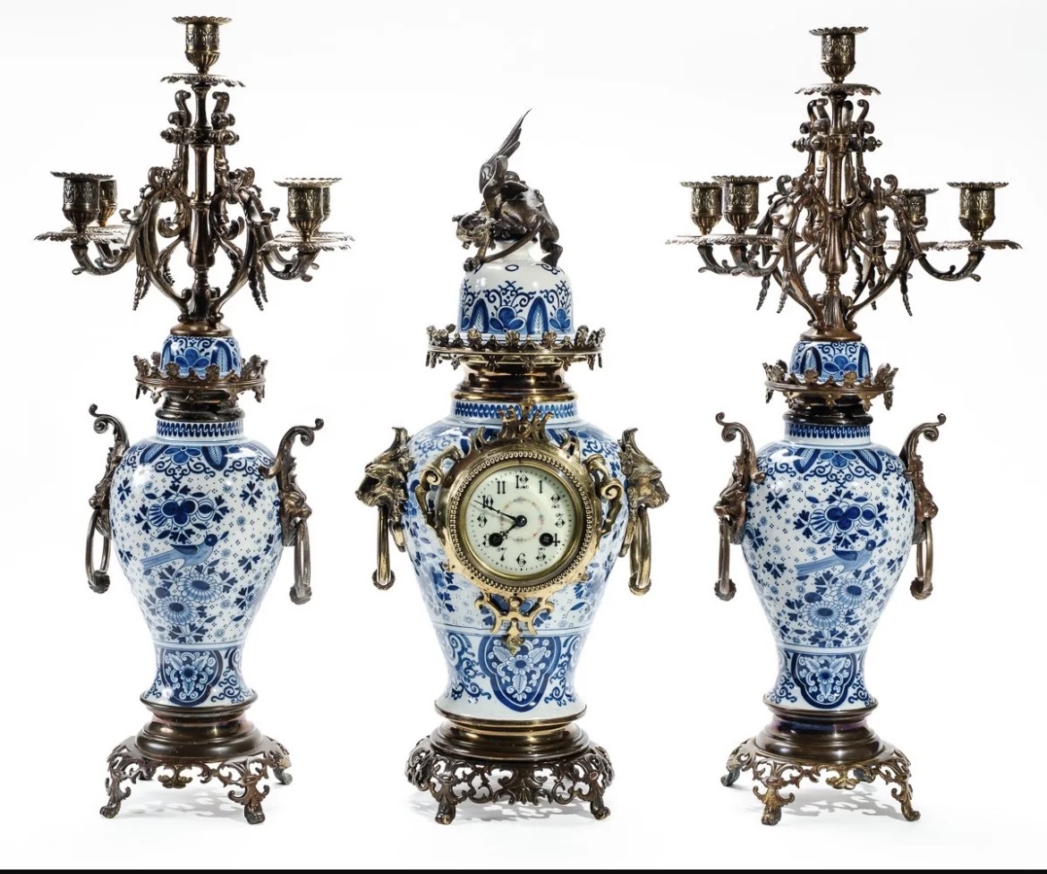 Delft-style Ceramic Fireplace Trim On A Bronze And Brass Frame