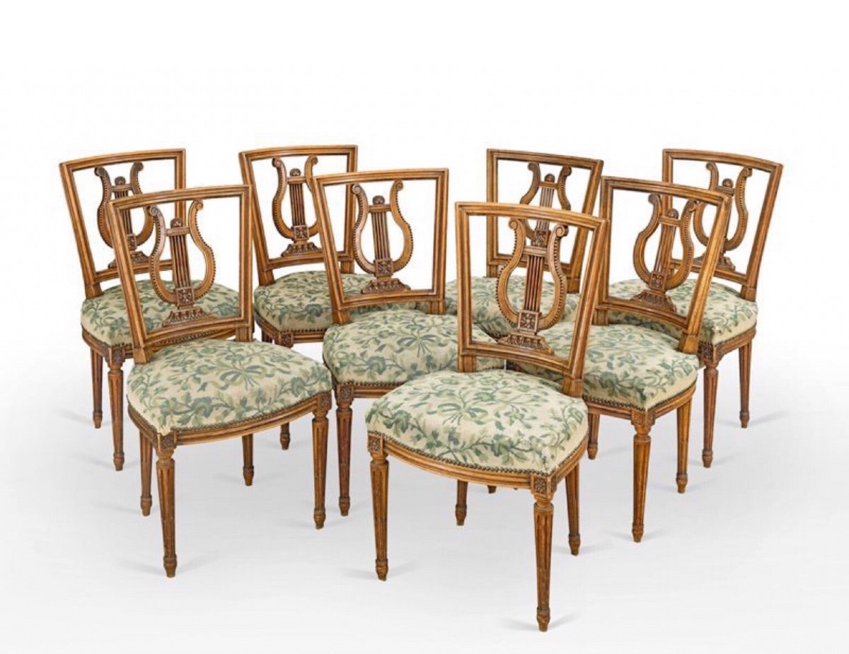 Suite Of Eight Chairs In Molded And Carved Wood