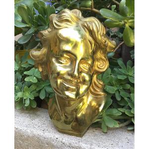 D’apres Injalbert.enfant rieur. Bronze à double patine