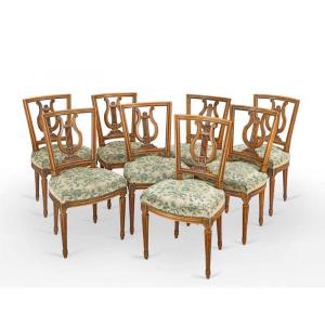 Suite Of Eight Chairs In Molded And Carved Wood