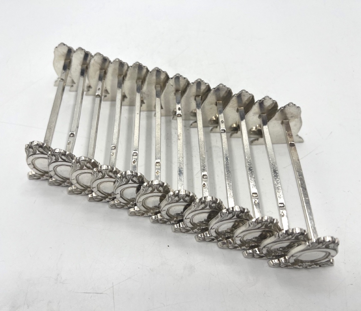 12 porte couteaux en argent massif par Sanoner-photo-3