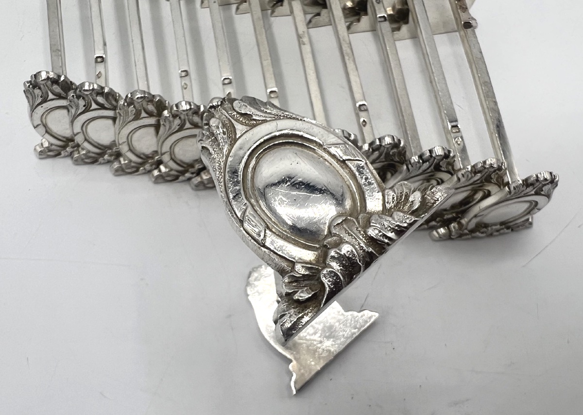 12 porte couteaux en argent massif par Sanoner-photo-1