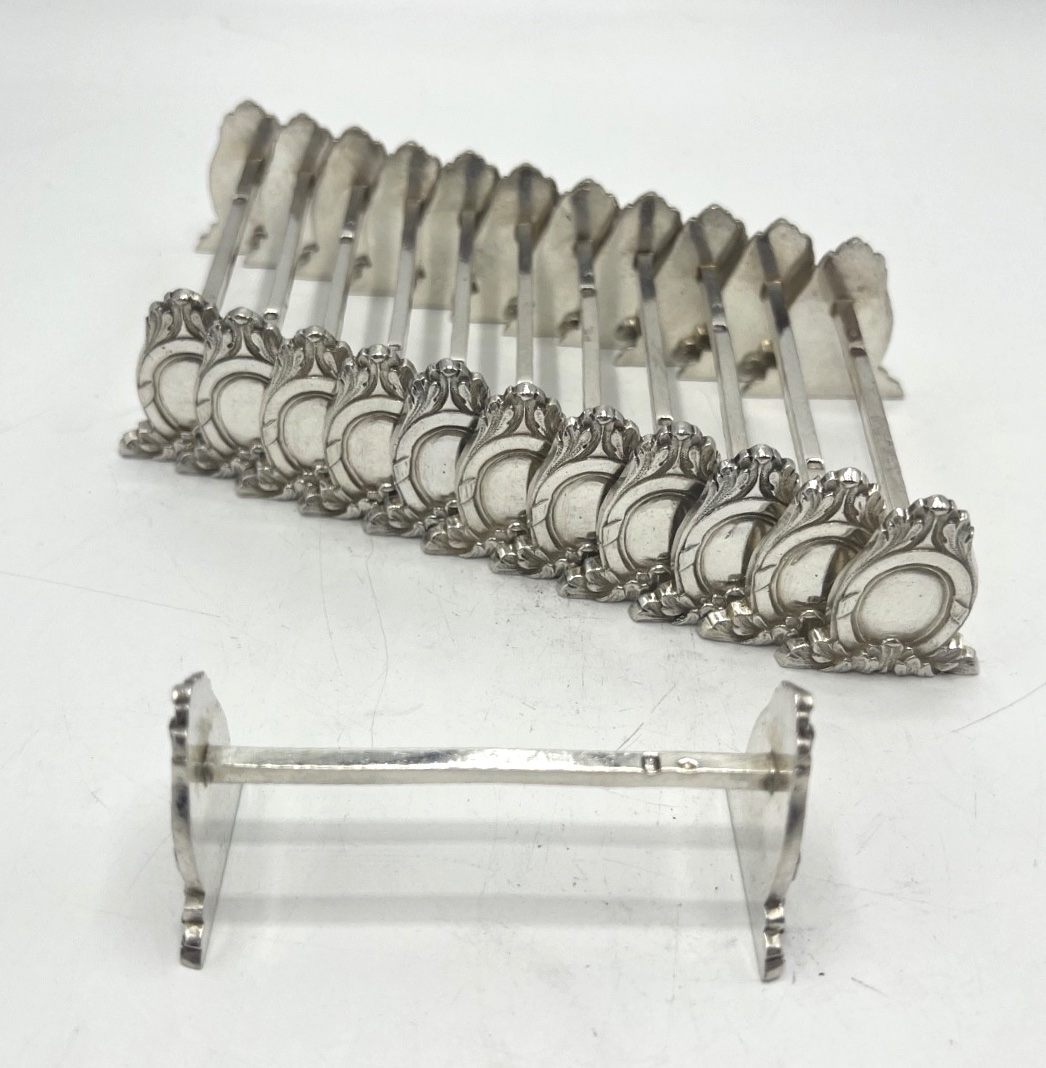 12 porte couteaux en argent massif par Sanoner-photo-2