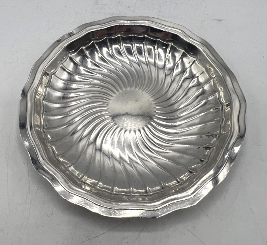 Dessous de bouteille en argent massif par Puiforcat