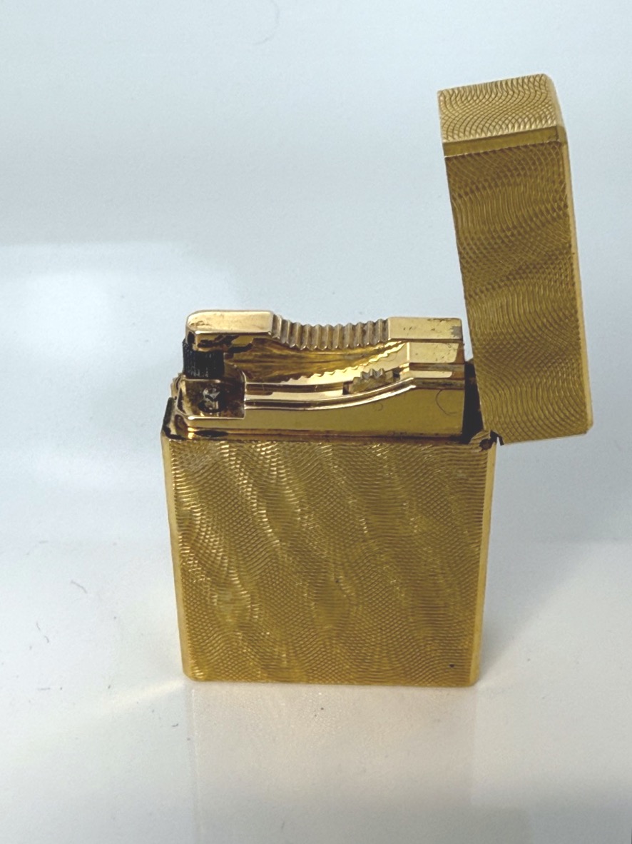 Briquet plaqué or par Dupont pour Hermès-photo-1